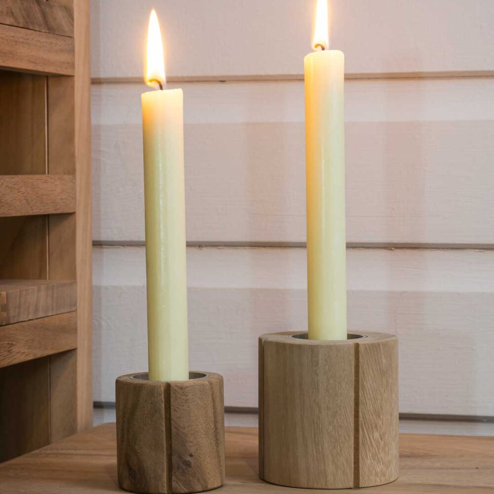 groove wooden candle-holders shown with dinner candles lit.