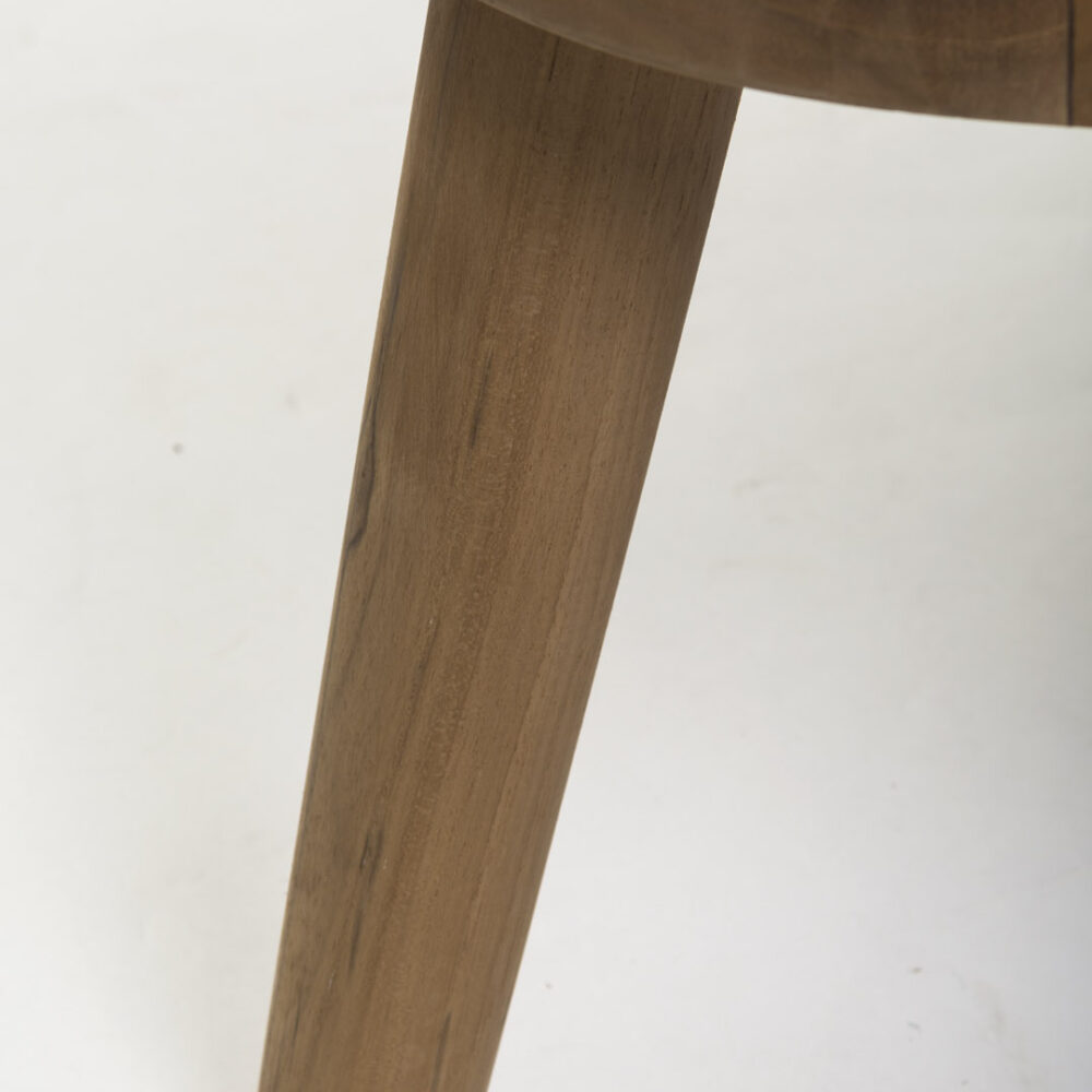 Close up shawoing the tapered teak leg of the Harris contemporary outdoor seating range.