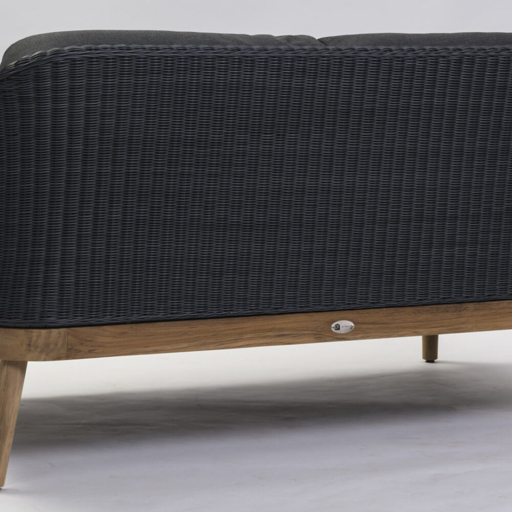 Angled photo of the back of the Harris 2 seat sofa in slate weave and teak